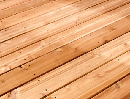 Premium cedar decking material installed by Pro Deck & Design in Kansas City, highlighting natural wood grain beauty and durability for custom deck construction projects throughout Johnson County neighborhoods