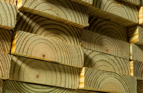 Premium quality pressure-treated lumber used by Pro Deck & Design in Kansas City, showcasing superior wood grain selection for durable custom deck construction throughout Johnson County, Wyandotte County, and Leavenworth County