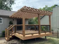 Custom cedar deck and pergola installation in Kansas City featuring expert craftsmanship, quality pressure-treated lumber, and professional design perfect for Kansas homes seeking durable outdoor entertainment spaces