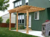 Custom cedar pergola installation in Kansas City featuring quality materials and expert craftsmanship, perfect for enhancing Johnson County homes with stylish outdoor living spaces that provide shade and architectural interest