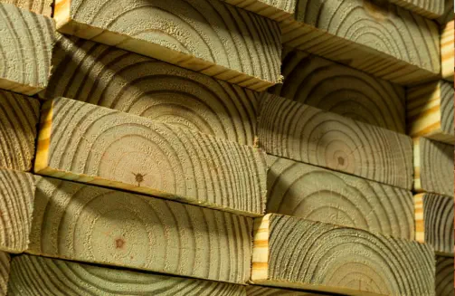 Premium quality pressure-treated lumber used by Pro Deck & Design in Kansas City, showcasing superior wood grain selection for durable custom deck construction throughout Johnson County, Wyandotte County, and Leavenworth County
