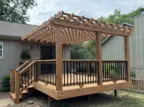 Custom cedar deck and pergola installation in Kansas City featuring expert craftsmanship, quality pressure-treated lumber, and professional design perfect for Kansas homes seeking durable outdoor entertainment spaces