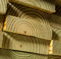 Premium quality pressure-treated lumber used by Pro Deck & Design in Kansas City, showcasing superior wood grain selection for durable custom deck construction throughout Johnson County, Wyandotte County, and Leavenworth County