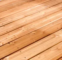 Premium cedar and redwood decking material installed by Pro Deck & Design in Kansas City, highlighting natural wood grain beauty and durability for custom deck construction projects throughout Johnson County neighborhoods