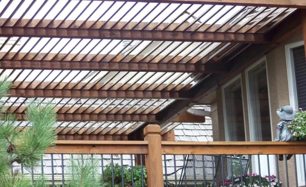 Custom cedar pergola installation in Kansas City providing stylish partial shade for decks and patios, featuring expert craftsmanship and quality materials perfect for enhancing Missouri outdoor living spaces year-round